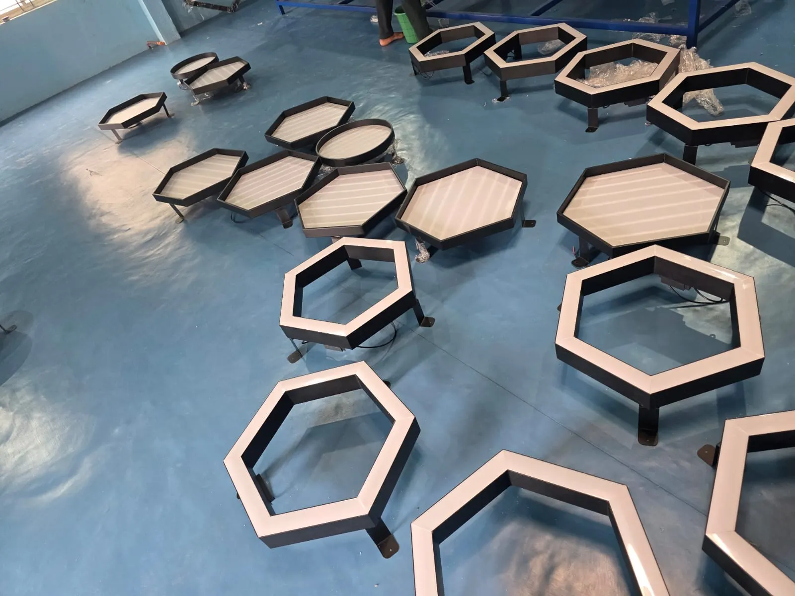 Batch of hexagon luminaires on the workshop floor