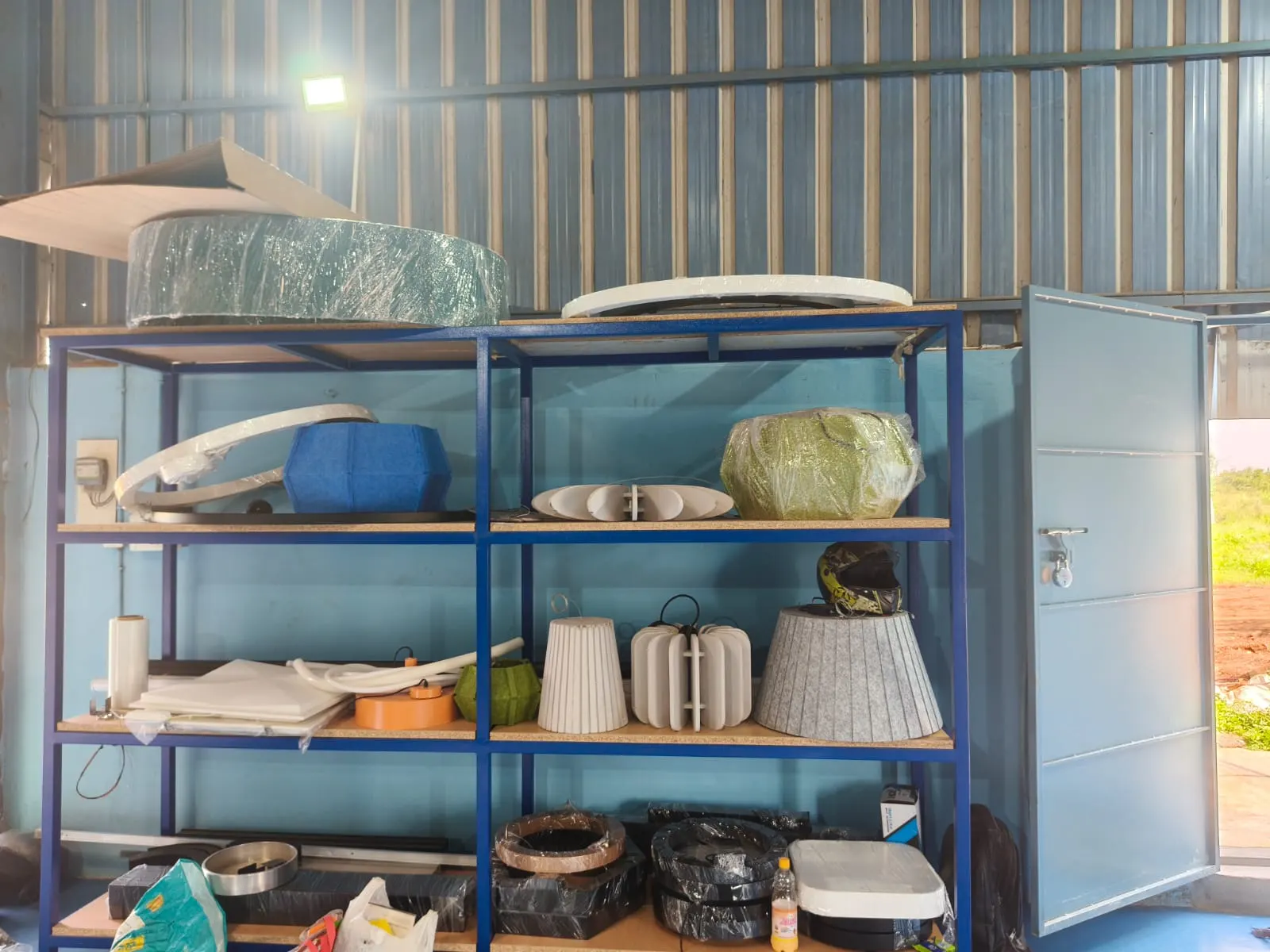 Workshop racks with ring, drum, fabric and acoustic pendant samples